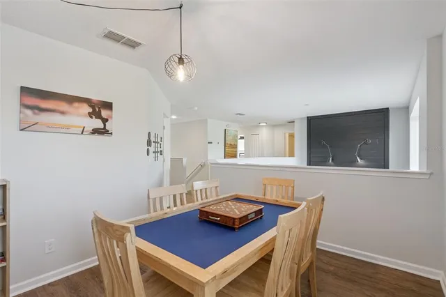 a bedroom with a bed and a mirror