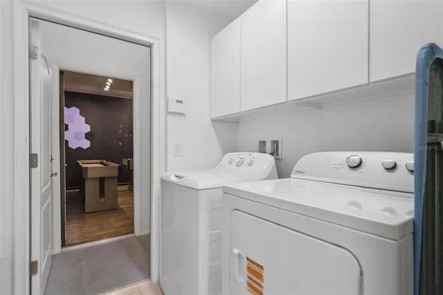 a view of a swimming pool with a outdoor seating