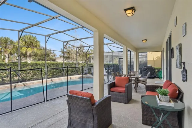 an aerial view of residential houses with outdoor space and river
