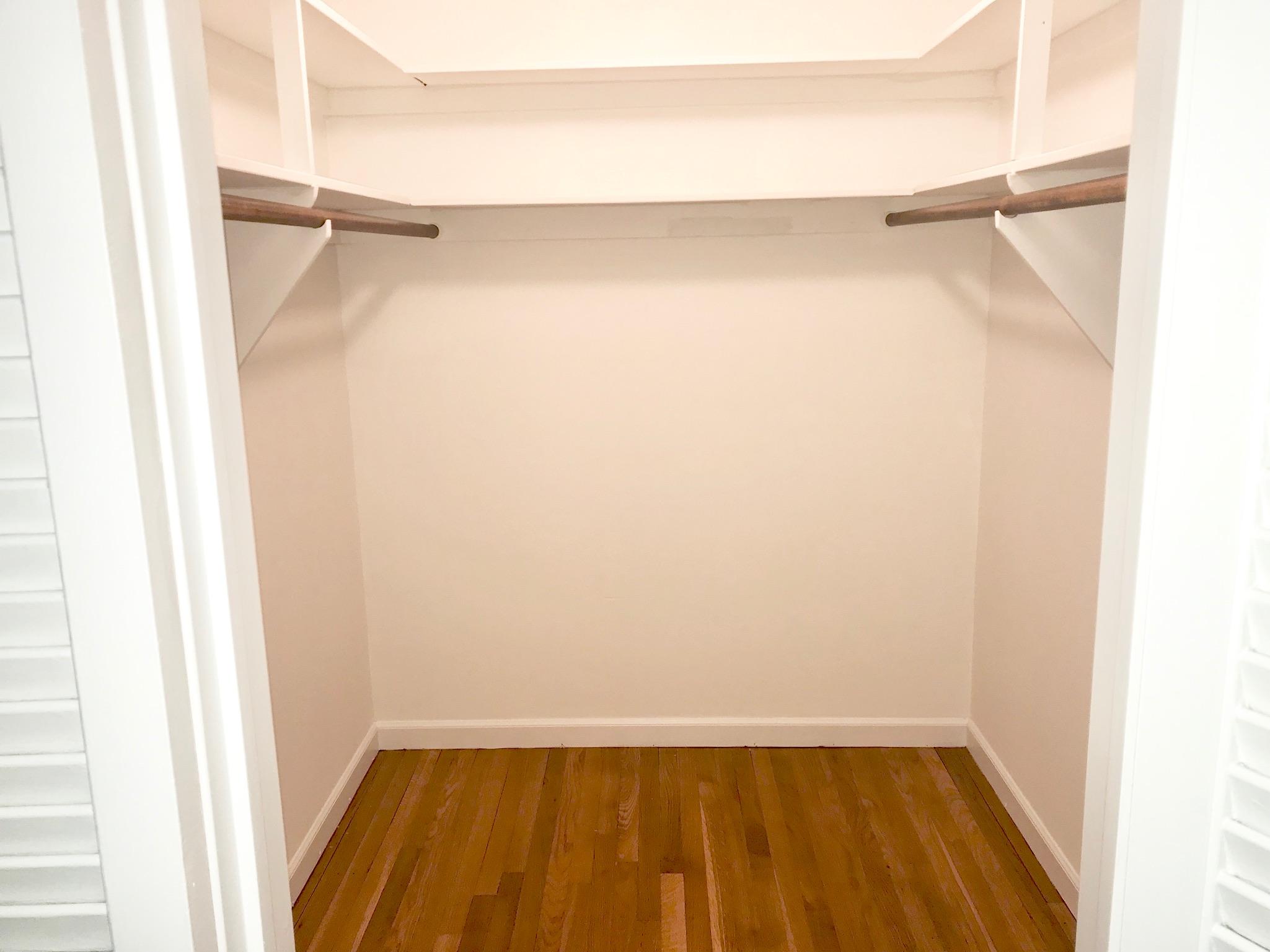191 Laurel Road New Canaan, CT 06840 - Photo 20 of 39 a view of walk in closet with empty racks