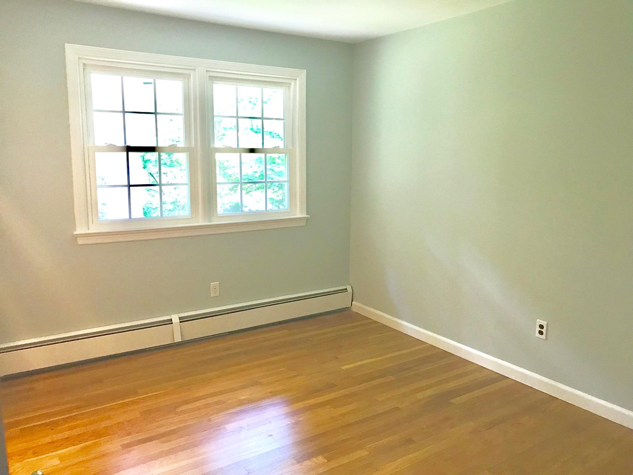191 Laurel Road New Canaan, CT 06840 - Photo 24 of 39 an empty room with a empty space and window