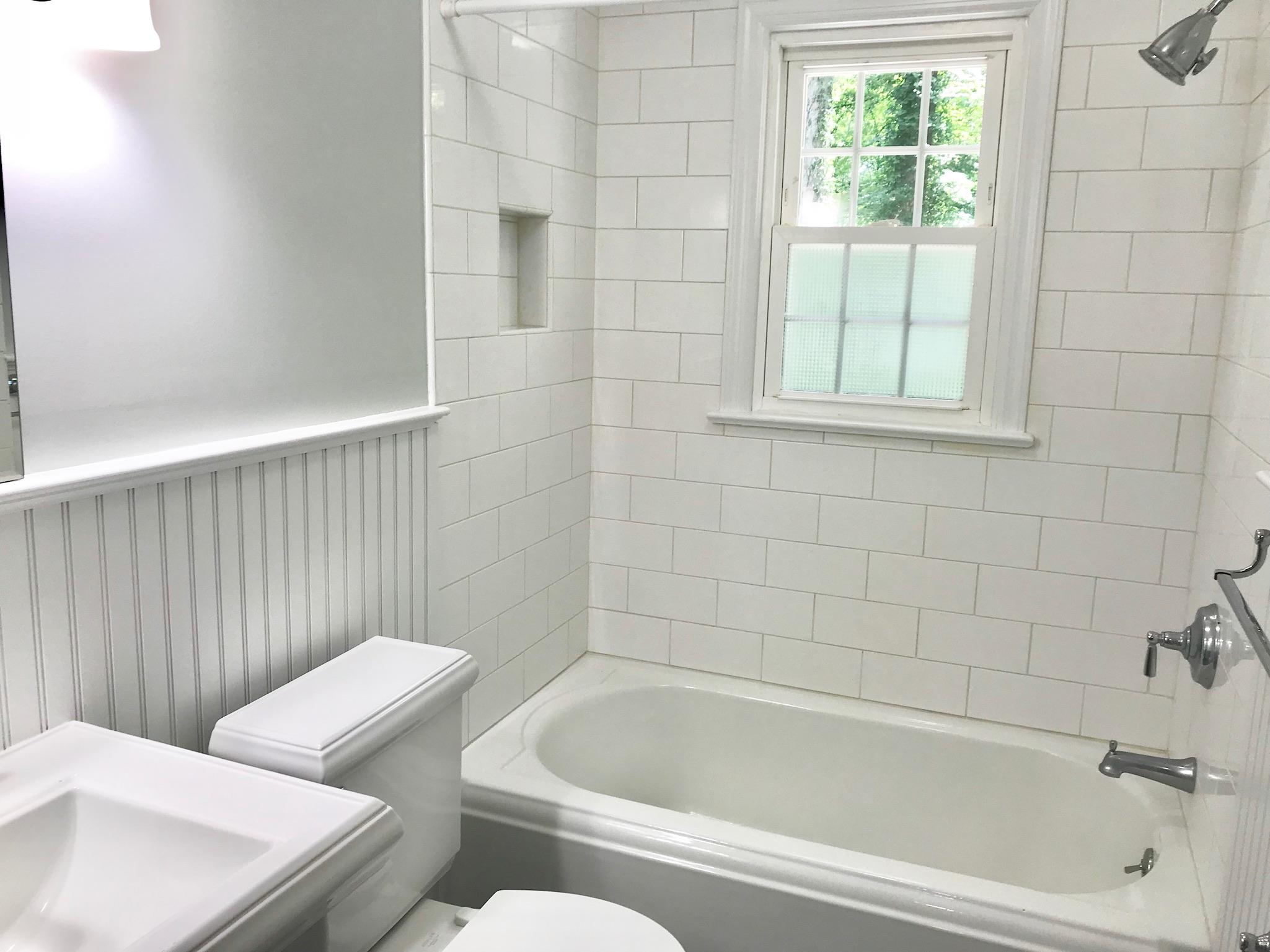 191 Laurel Road New Canaan, CT 06840 - Photo 27 of 39 a bathroom with a sink and bathtub with toilet