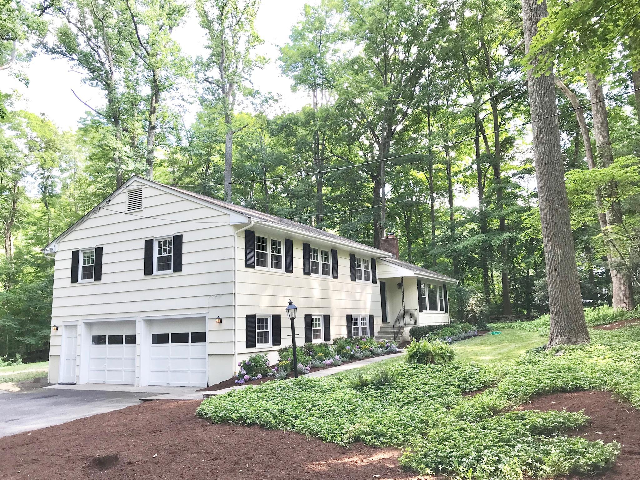 191 Laurel Road New Canaan, CT 06840 - Photo 39 of 39 a view of a yard in front of house