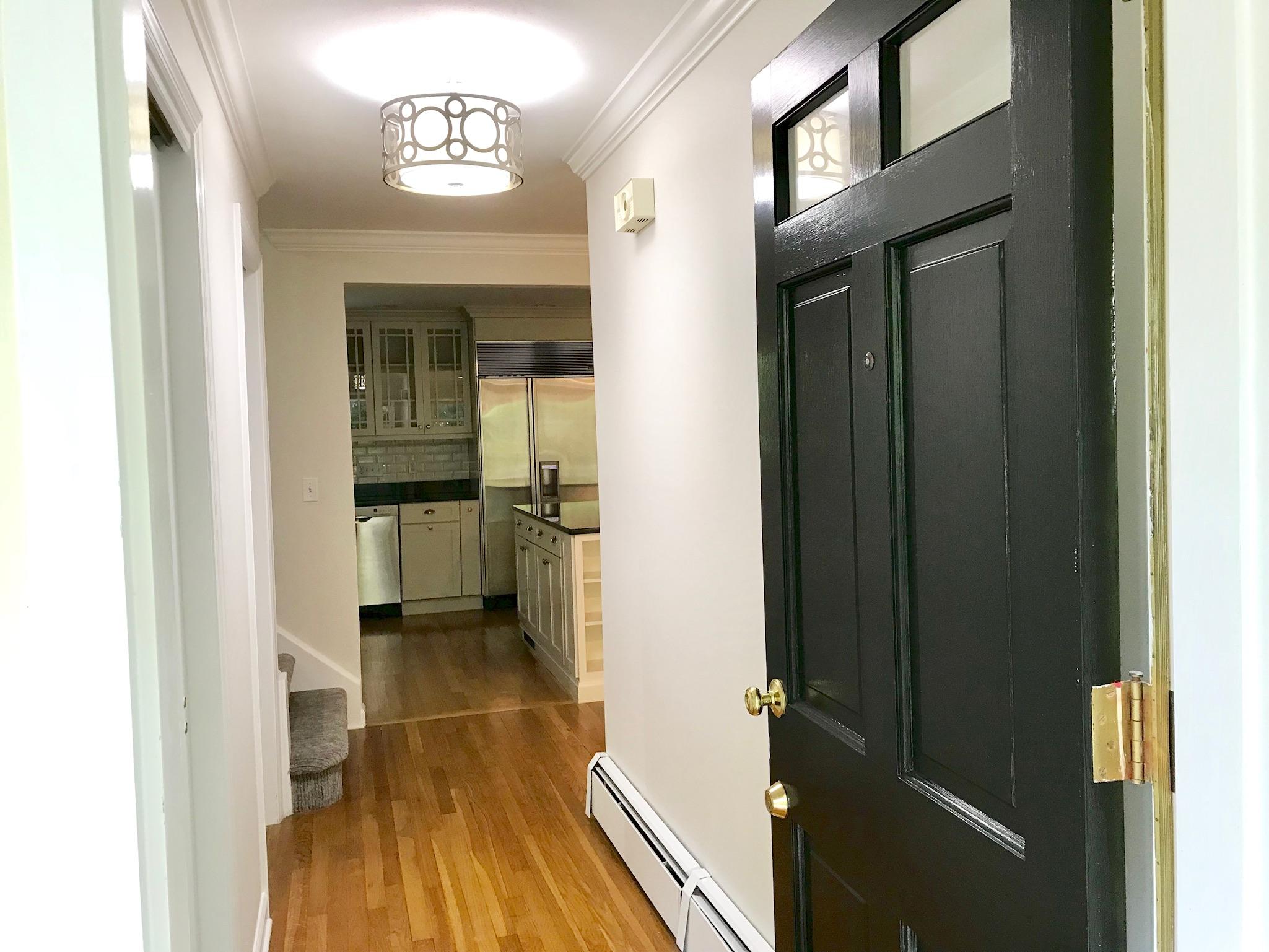 191 Laurel Road New Canaan, CT 06840 - Photo 6 of 39 a view of hallway with wooden floor