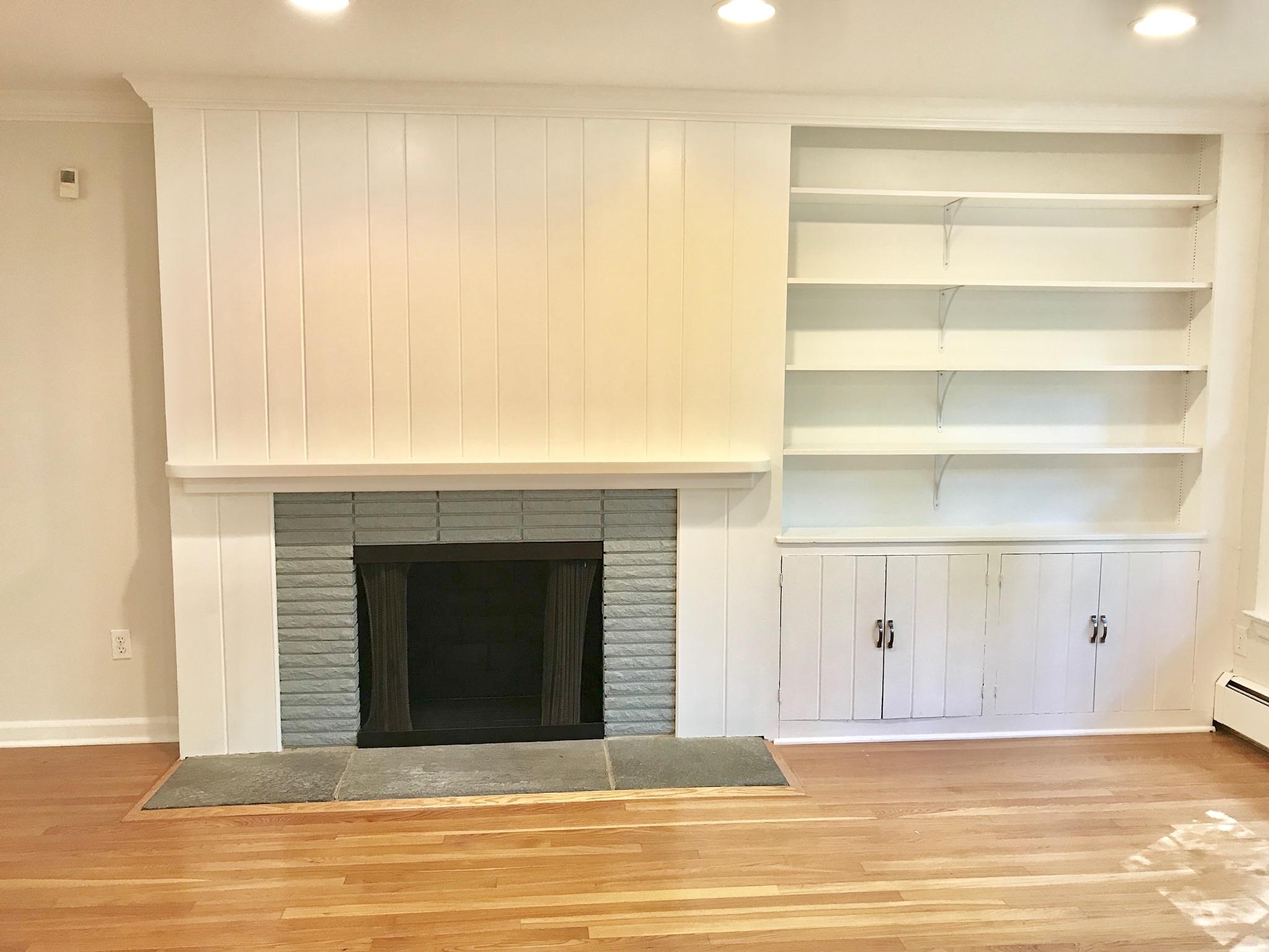 191 Laurel Road New Canaan, CT 06840 - Photo 9 of 39 a view of a livingroom with a staircase