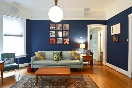 Undisclosed Address Chicago, IL 60647 - Photo 11 of 25 a living room with furniture and a rug