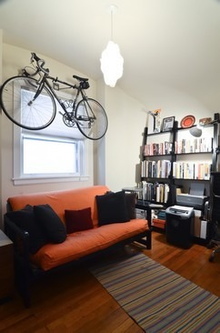 Undisclosed Address Chicago, IL 60647 - Photo 19 of 25 a living room with furniture a rug and a window