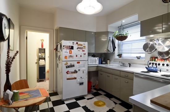 Undisclosed Address Chicago, IL 60647 - Photo 20 of 25 a kitchen with stainless steel appliances a sink and a refrigerator