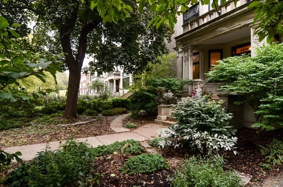 Undisclosed Address Chicago, IL 60647 - Photo 2 of 25 a view of house with a tree