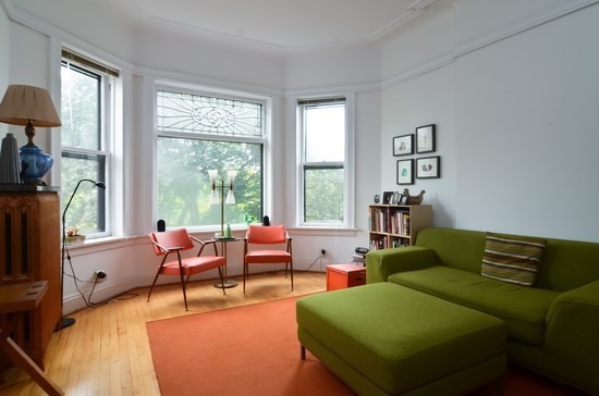 Undisclosed Address Chicago, IL 60647 - Photo 21 of 25 a living room with furniture and a large window