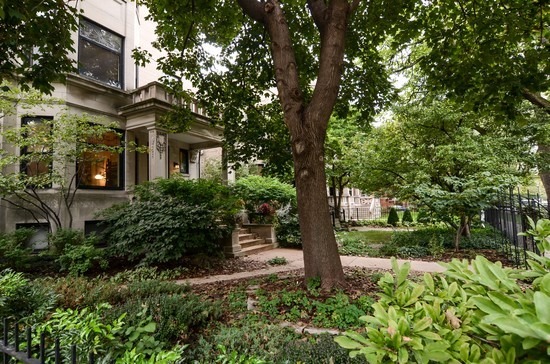 Undisclosed Address Chicago, IL 60647 - Photo 25 of 25 a front view of a house with garden