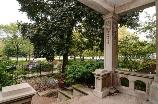 Undisclosed Address Chicago, IL 60647 - Photo 3 of 25 a view of a garden from a balcony