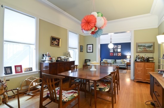 Undisclosed Address Chicago, IL 60647 - Photo 9 of 25 a view of a dining room with furniture and wooden floor