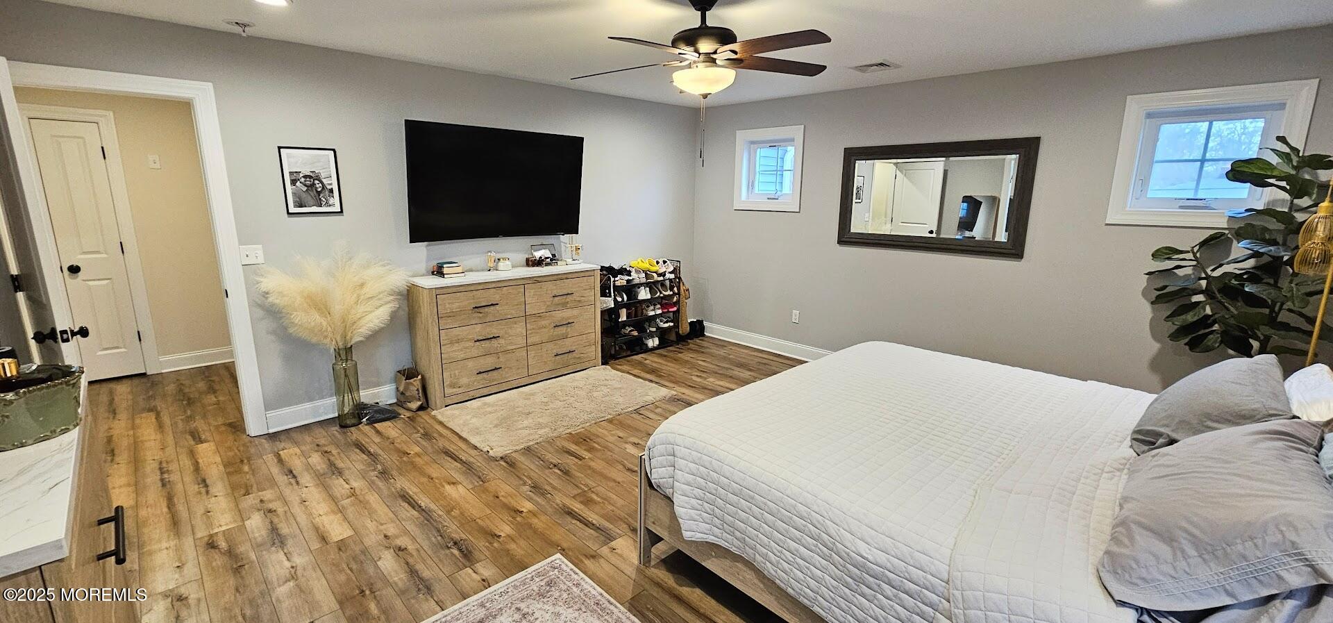 137 Jordan Road Brick, NJ 08724 - Photo 18 of 38 a bedroom with a bed and a flat screen tv