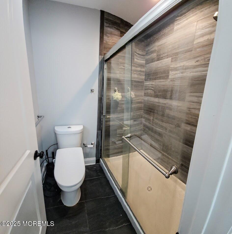 137 Jordan Road Brick, NJ 08724 - Photo 21 of 38 a bathroom with a toilet and a shower