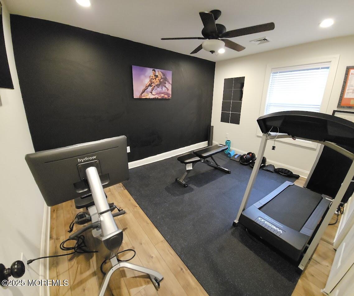 137 Jordan Road Brick, NJ 08724 - Photo 22 of 38 a living room with furniture and a flat screen tv
