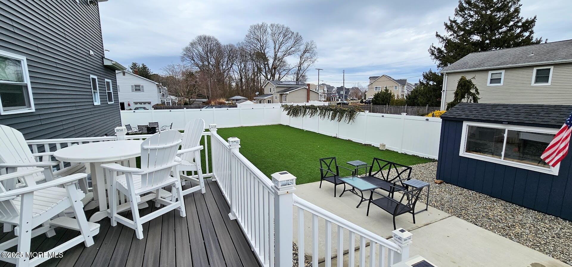 137 Jordan Road Brick, NJ 08724 - Photo 28 of 38 a balcony with table and chairs