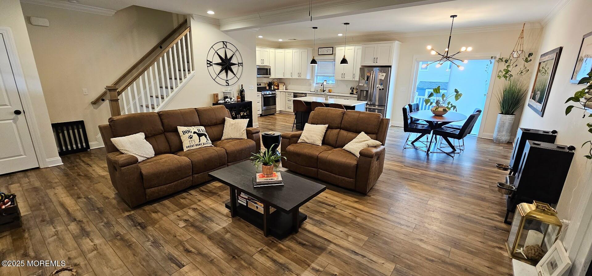 137 Jordan Road Brick, NJ 08724 - Photo 5 of 38 a living room with furniture and a chandelier