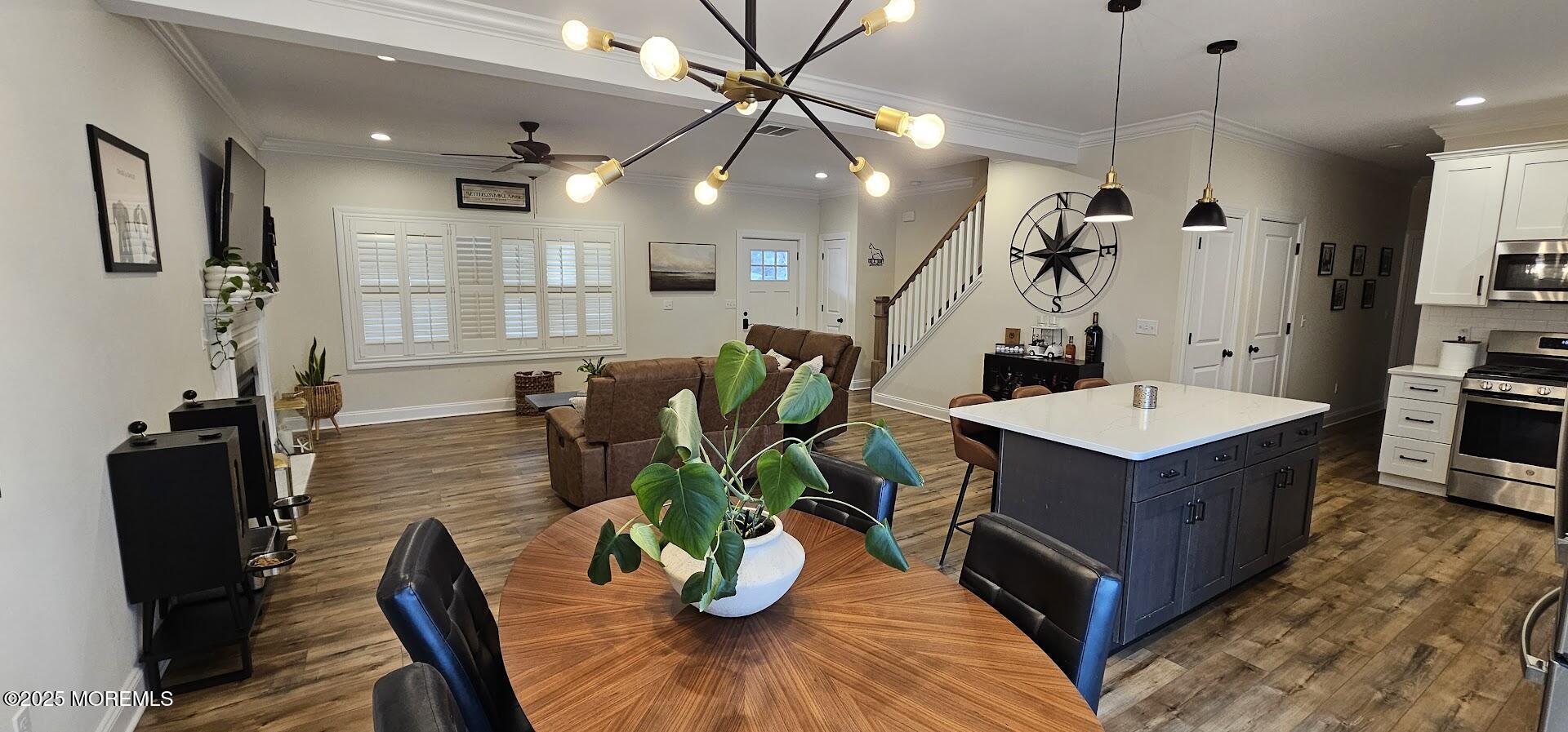 137 Jordan Road Brick, NJ 08724 - Photo 7 of 38 a living room with furniture kitchen view and a chandelier