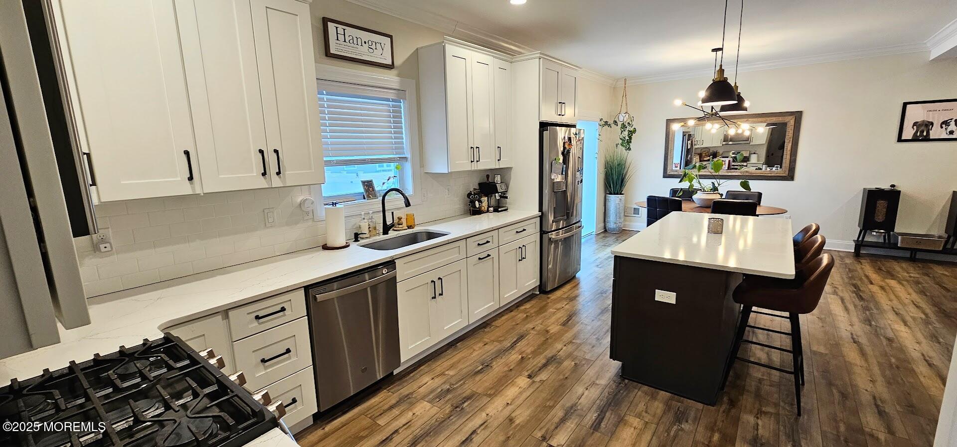 137 Jordan Road Brick, NJ 08724 - Photo 9 of 38 a kitchen with a sink stove and refrigerator