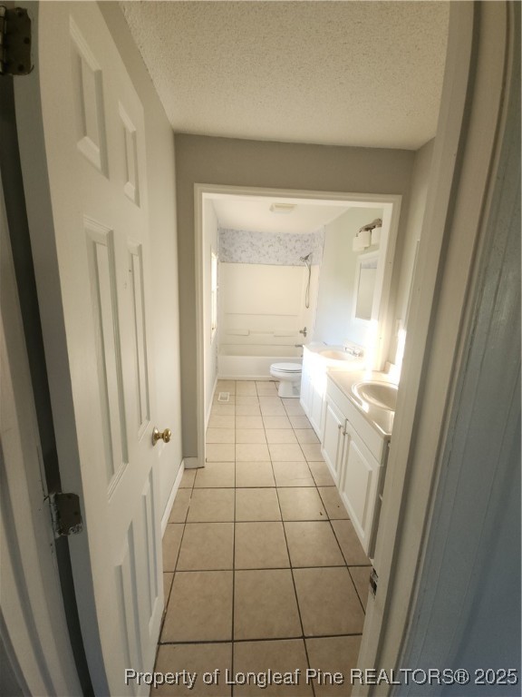 803 Antioch Church Road Dunn, NC 28334 - Photo 5 of 17 a bathroom with a sink a toilet and a shower