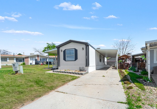2600 North Hill Field Road, Unit 103A Layton, UT 84041 - Photo 4 of 31 Single-story residence featuring a covered entry porch and a covered carport