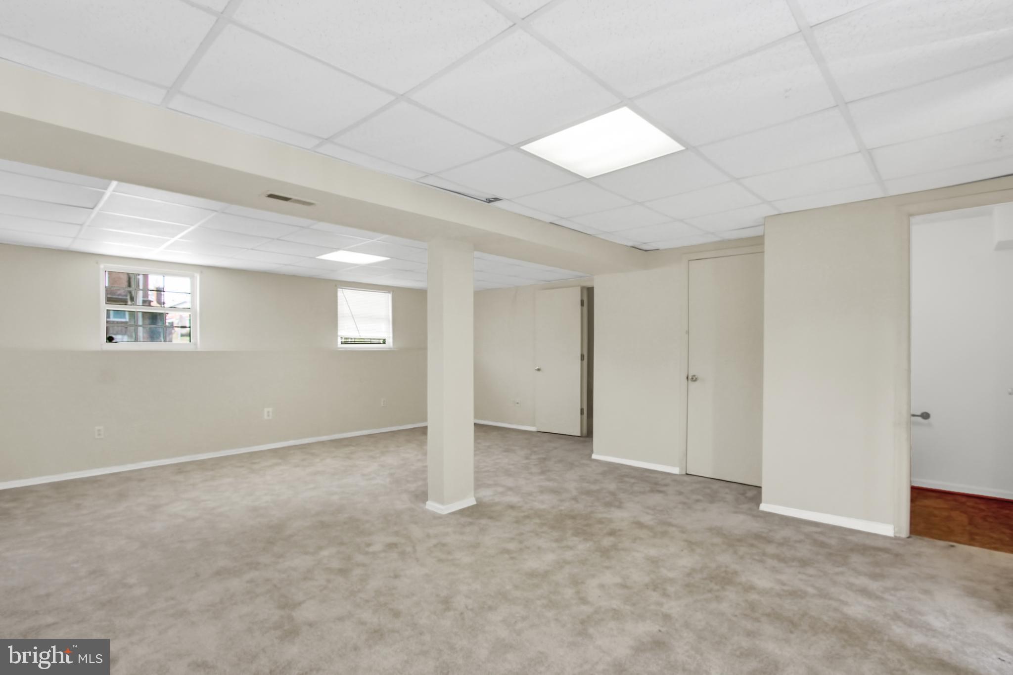 226 Stemmers Run Road Baltimore, MD 21221 - Photo 20 of 26 a view of an empty room with a window