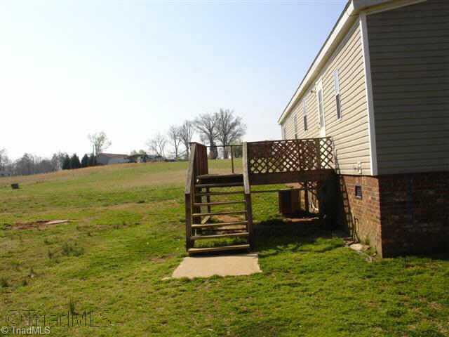 1687 Langley Loop Road Staley, NC 27355 - Photo 2 of 6 Other. Back/Deck