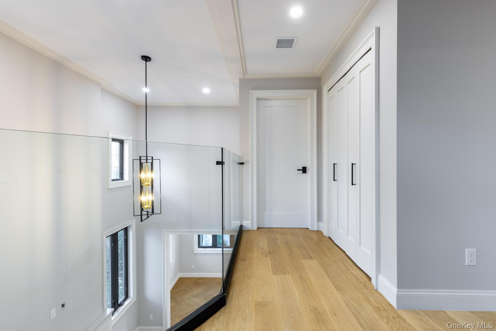 120 Baker Hill Road Great Neck, NY 11023 - Photo 12 of 25 a spacious bathroom with a tub and a shower