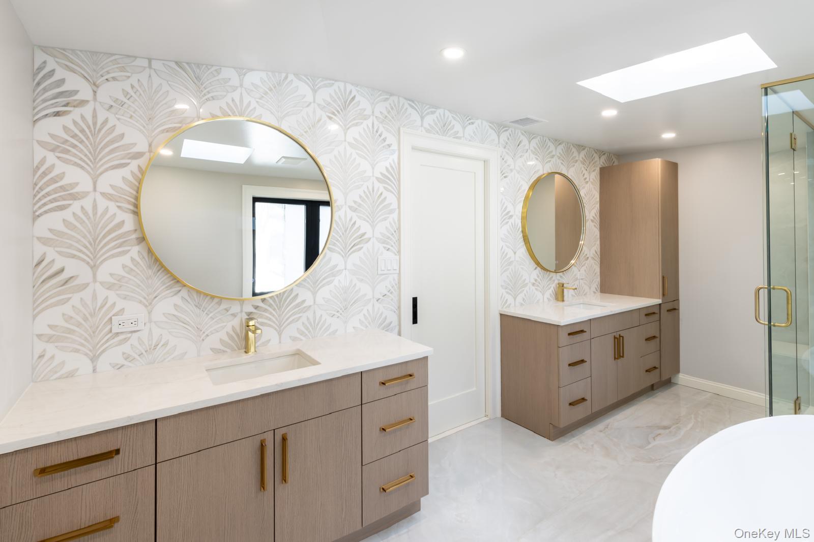 120 Baker Hill Road Great Neck, NY 11023 - Photo 14 of 25 a spacious bathroom with a double vanity sink double and mirror