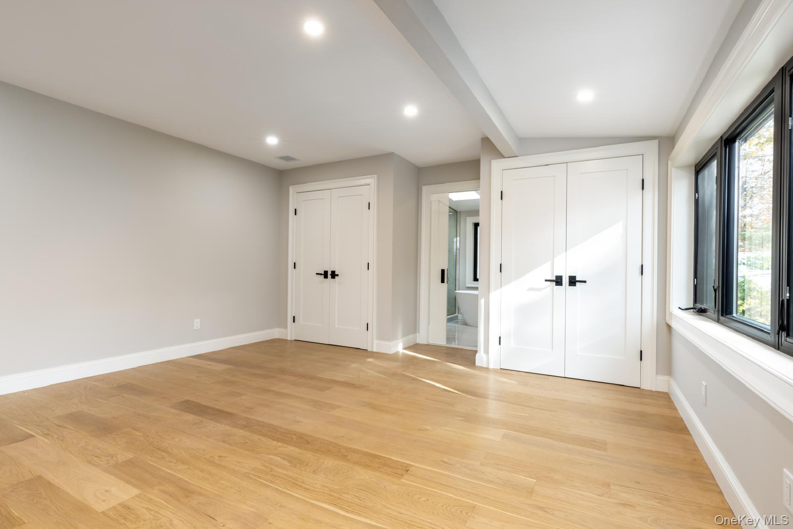 120 Baker Hill Road Great Neck, NY 11023 - Photo 23 of 25 a view of an empty room