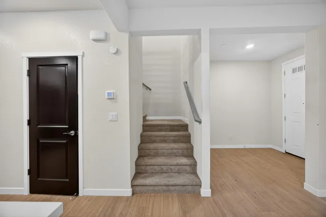 a view of entryway with wooden floor