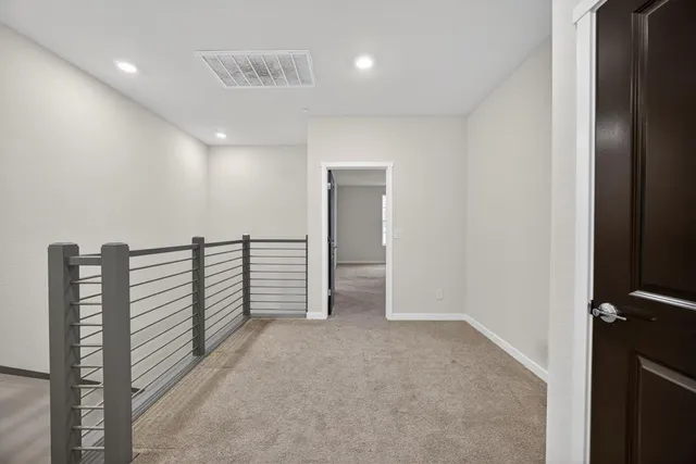 a view of hallway with stairs