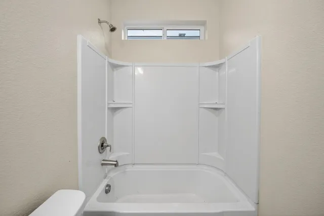 a bathroom with a bathtub