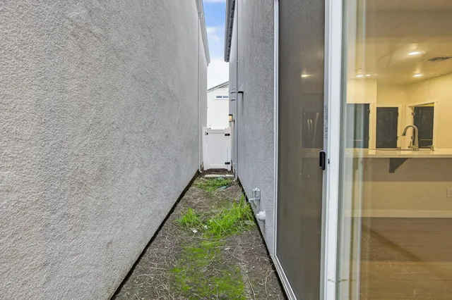 a view of a hallway with a shower