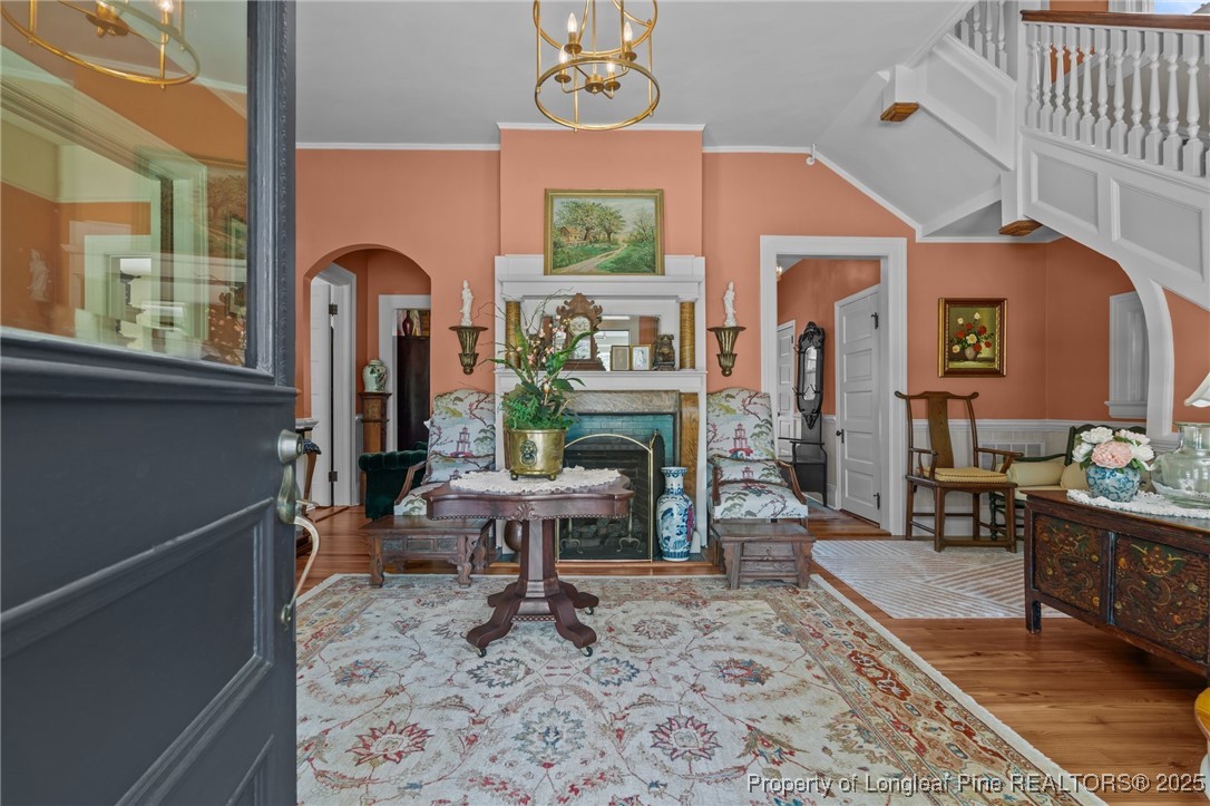 300 High Street Aberdeen, NC 28315 - Photo 11 of 50 a living room with furniture a fireplace and a rug