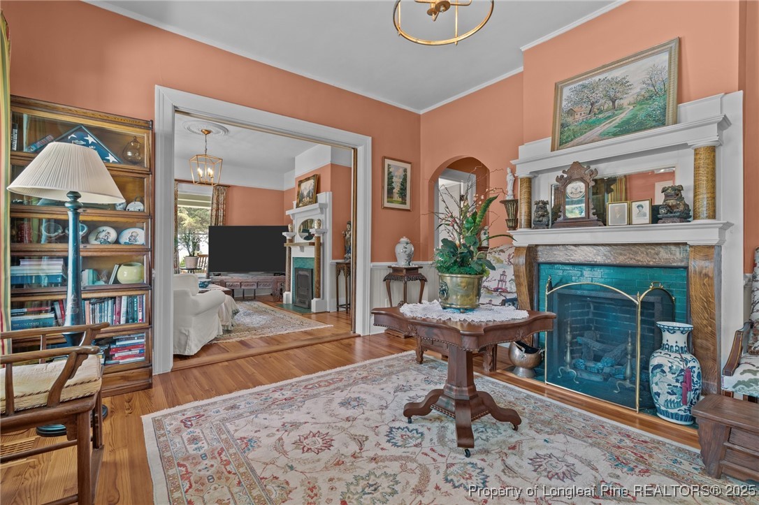 300 High Street Aberdeen, NC 28315 - Photo 16 of 50 a living room with furniture and a fireplace