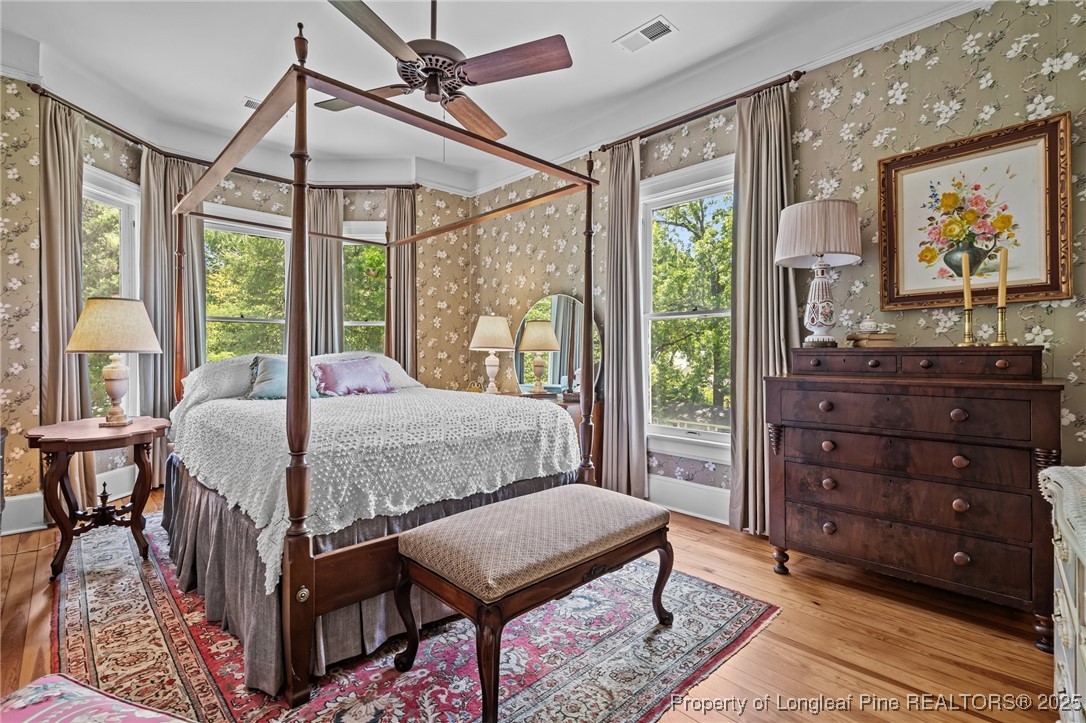 300 High Street Aberdeen, NC 28315 - Photo 39 of 50 a bed room with a bed window and a dresser