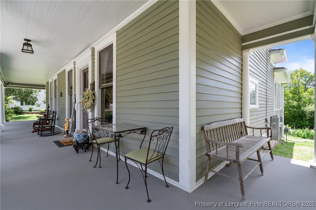 300 High Street Aberdeen, NC 28315 - Photo 44 of 50 a view of a balcony with chairs