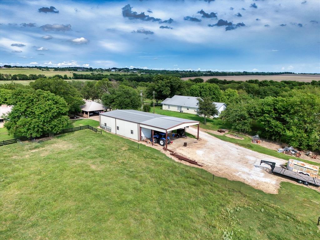 15796 Chapel Road Lorena, TX 76655 - Photo 23 of 28 an aerial view of a house with a garden