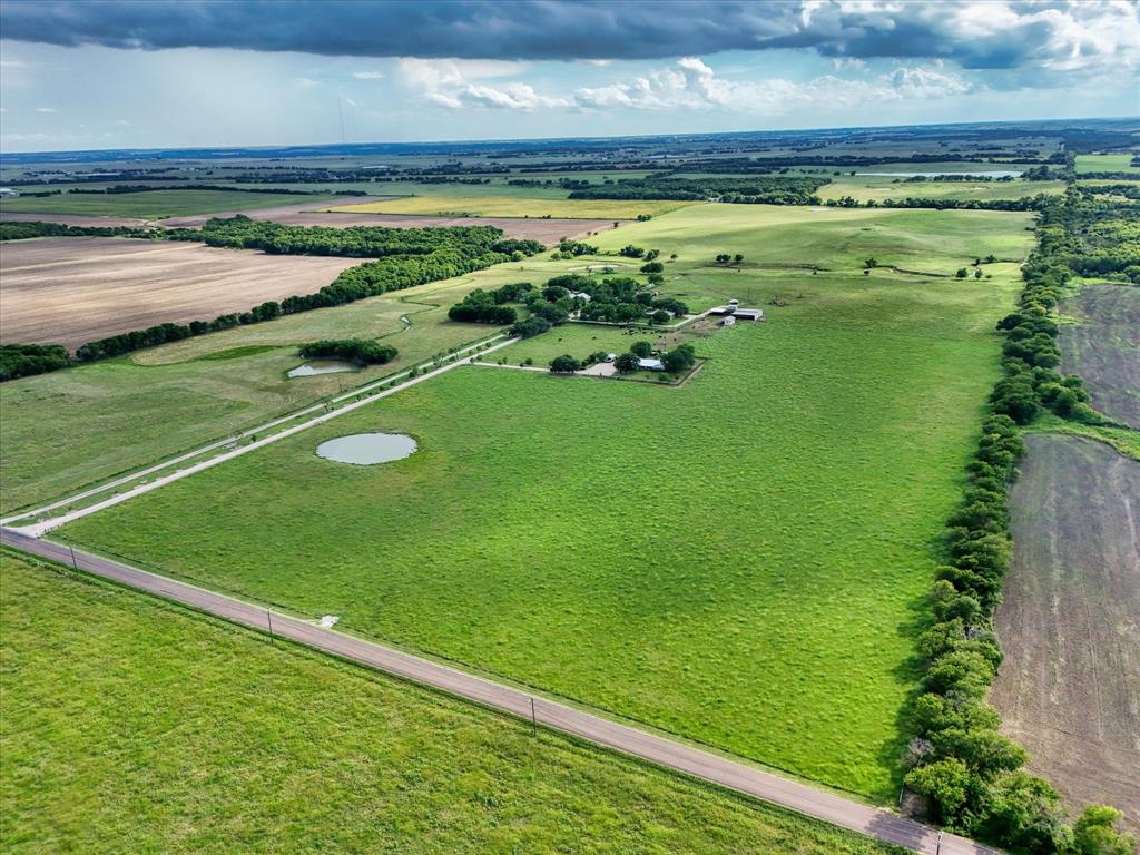 15796 Chapel Road Lorena, TX 76655 - Photo 3 of 28 a view of a golf course with a lake view