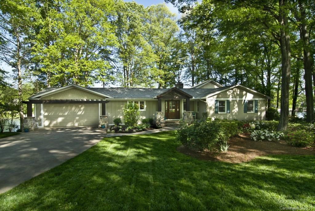 3320 Lake Shore Road South Denver, NC 28037 - Photo 1 of 21 a front view of a house with a yard