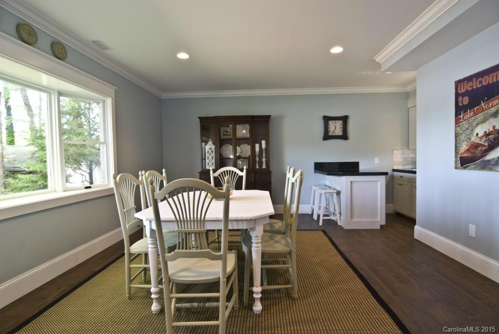 3320 Lake Shore Road South Denver, NC 28037 - Photo 18 of 21 a view of a dining room with furniture window and wooden floor