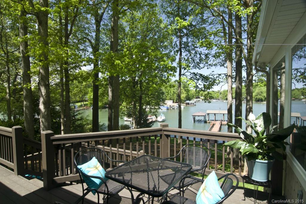 3320 Lake Shore Road South Denver, NC 28037 - Photo 21 of 21 a view of a chair and table on the deck