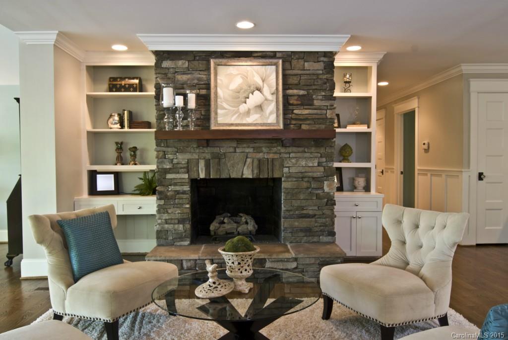 3320 Lake Shore Road South Denver, NC 28037 - Photo 5 of 21 a living room with furniture and a fireplace