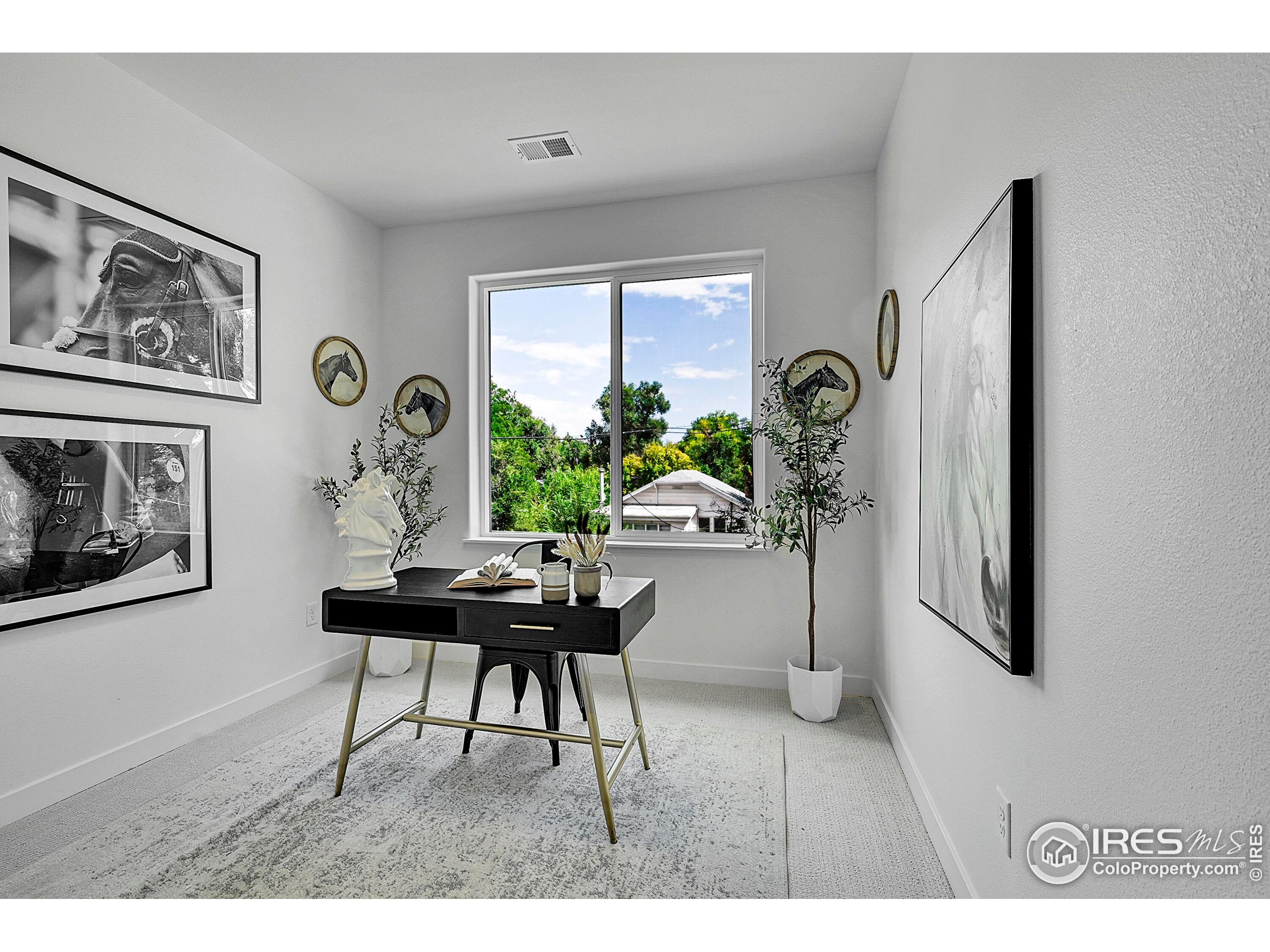 777 East County Line Road Erie, CO 80516 - Photo 14 of 15 a living room with furniture and a window