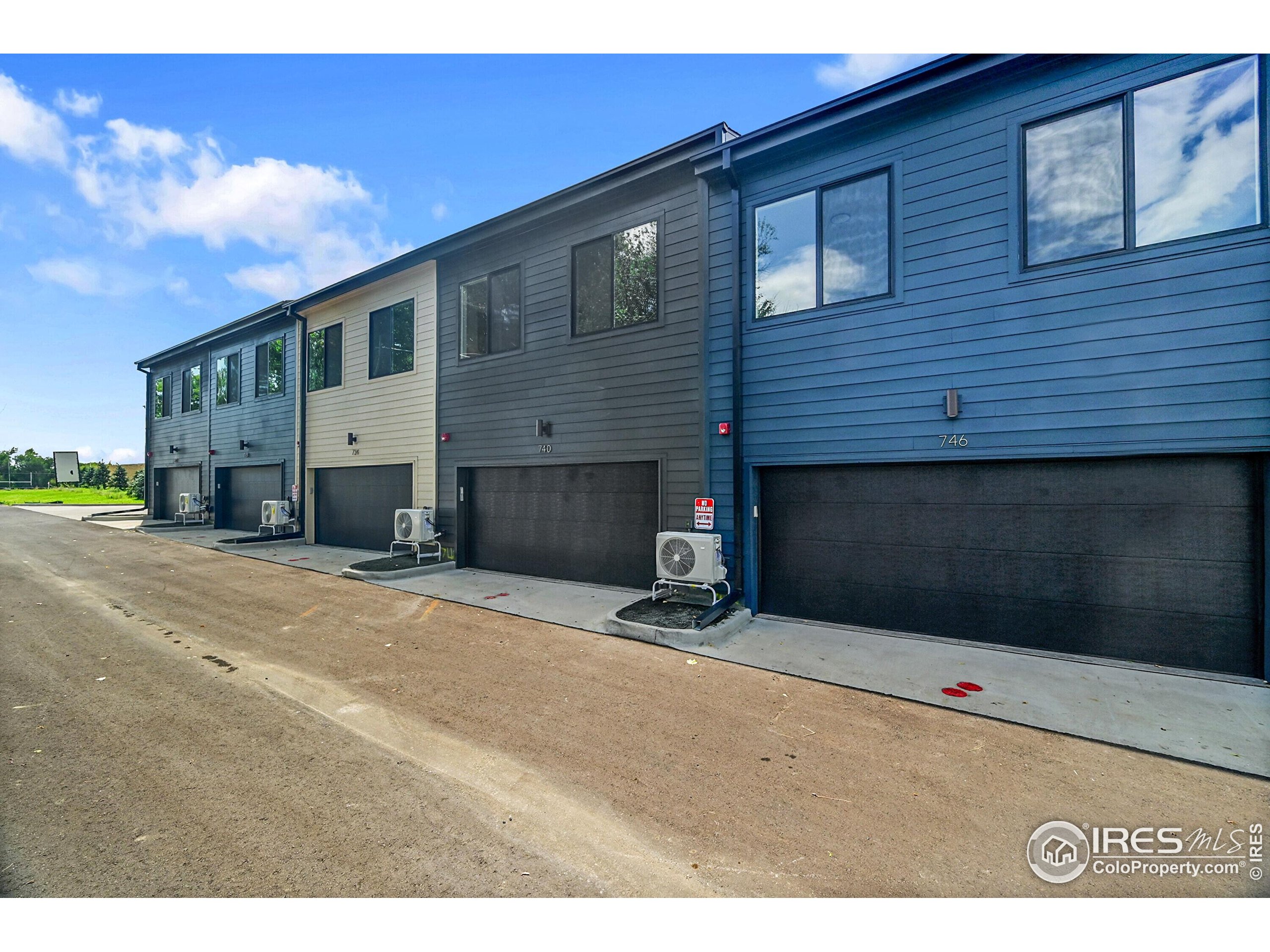 777 East County Line Road Erie, CO 80516 - Photo 15 of 15 a front view of a house with a yard