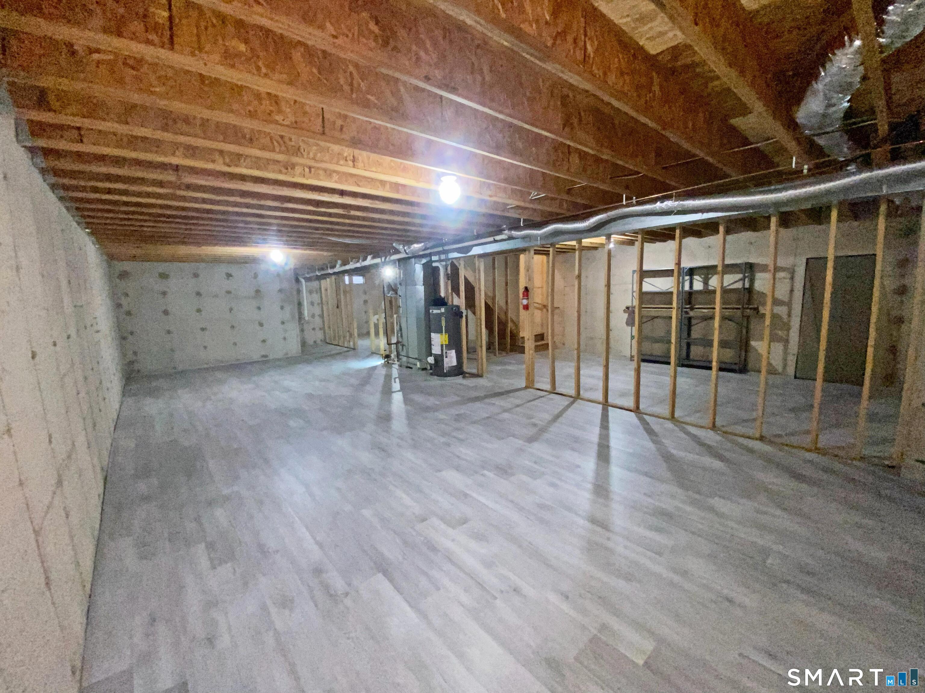 8 St George Place, Unit 8 Newtown, CT 06482 - Photo 17 of 31 a view of a room with wooden floor