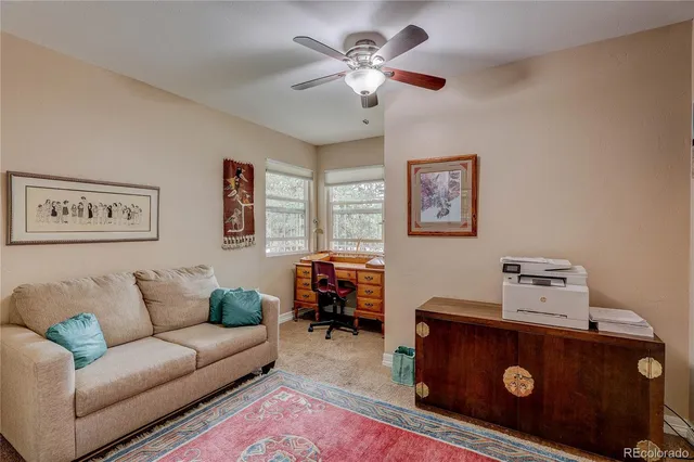 a living room with furniture and a couch