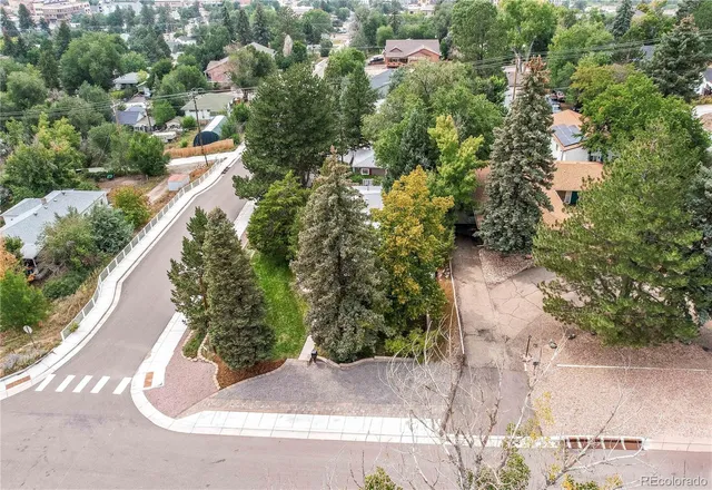 a view of a backyard of a house